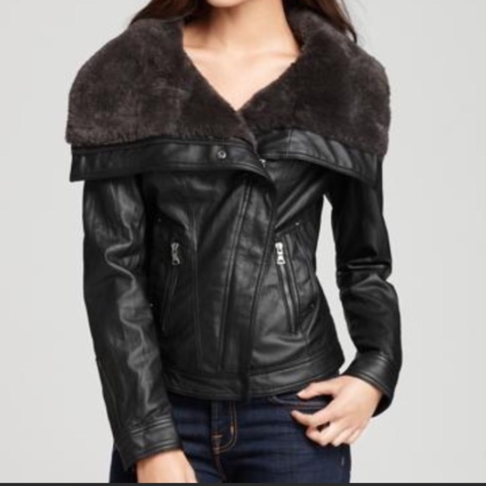 ISO this GUESS Black leather jacket. Size Small.